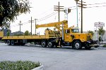 UP hi-rail Marmon tractor MW#05506 (with National boom crane) and hi-rail trailer STR 99